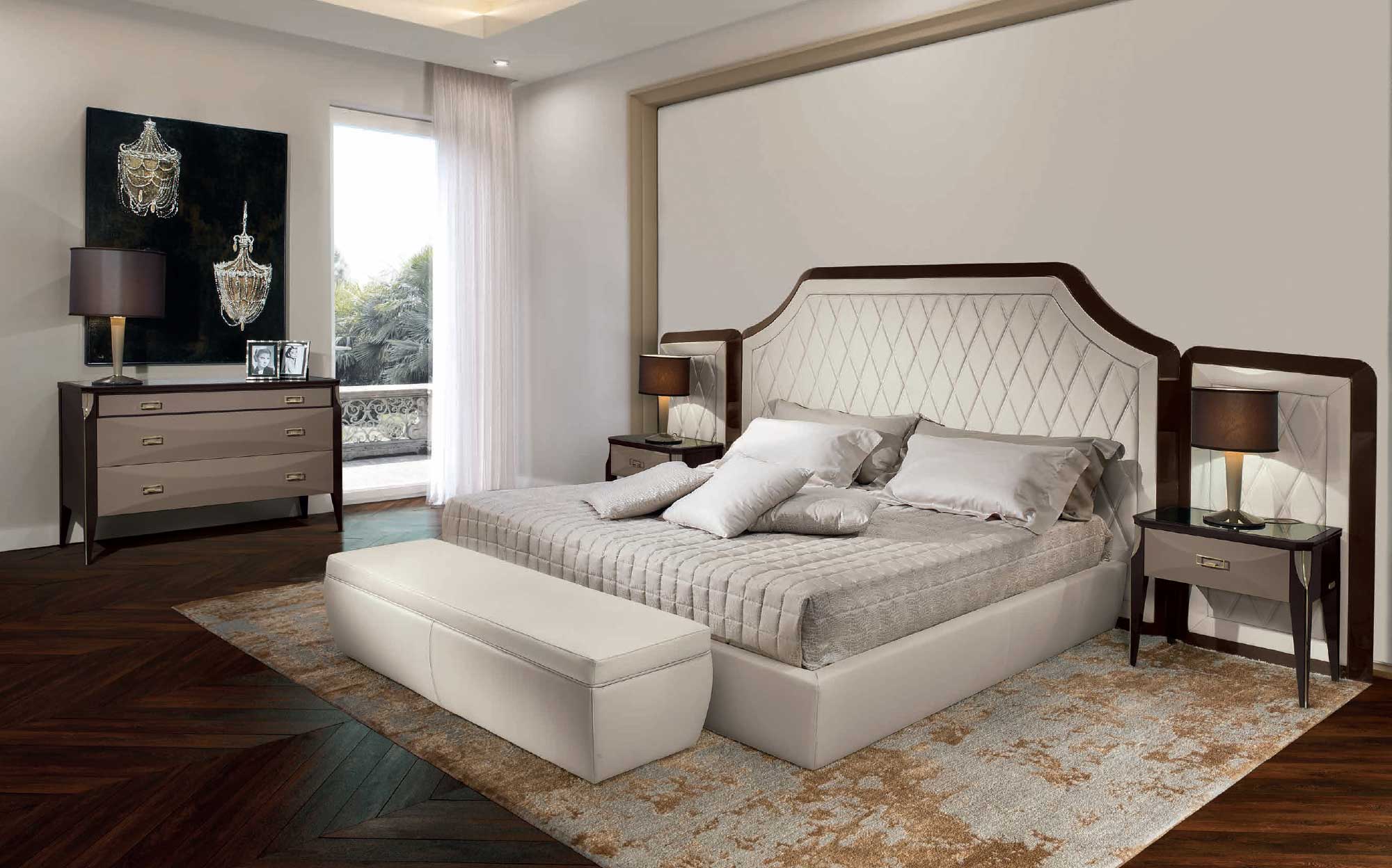 Elegant bedroom from the Cloe collection by Ceppi featuring a tufted upholstered bed, matching bedside tables and dresser in Canaletto walnut, refined luxury sleeping area.