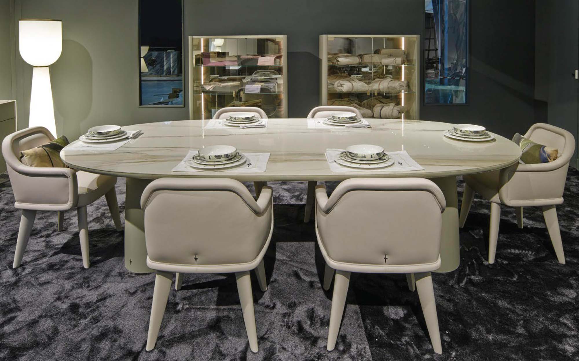 Elegant dining table with Cesare Paciotti Home chairs and stylish table setting | 101DOMUS Light-finish rectangular dining table with upholstered chairs by Cesare Paciotti Home