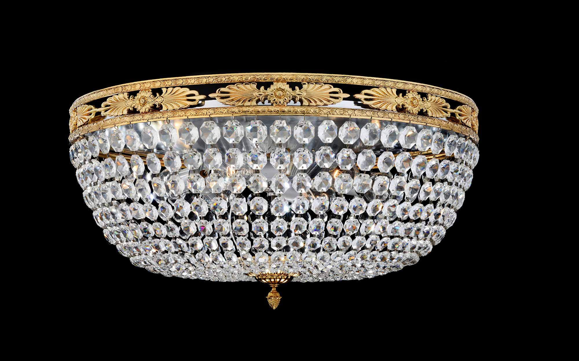 G. Moscatelli Crystal Flush Mount Chandelier | 101domus Classic crystal flush mount chandelier by G. Moscatelli with faceted crystal strands and gilded brass frame, elegant Italian ceiling lighting for luxury interiors.