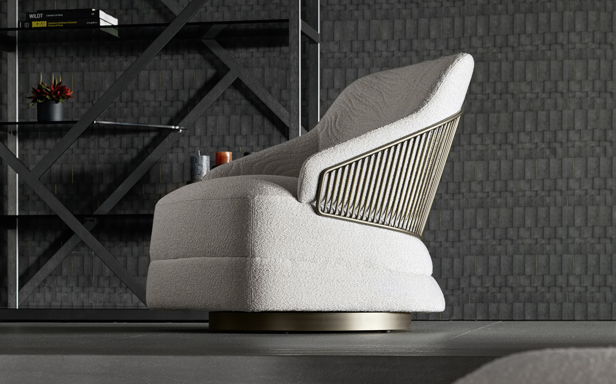 Elegance and comfort in a contemporary armchair design | 101DOMUS Modern armchair with golden metal frame and bouclé fabric