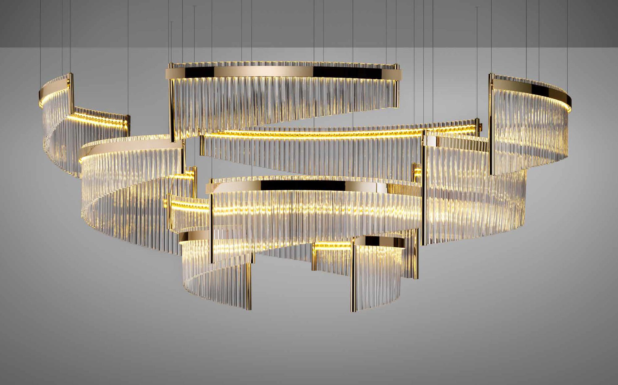 Contemporary chandelier by Il Paralume Marina featuring a gold metal structure and ribbed glass diffusers, elegant designer lighting for luxury interiors.
