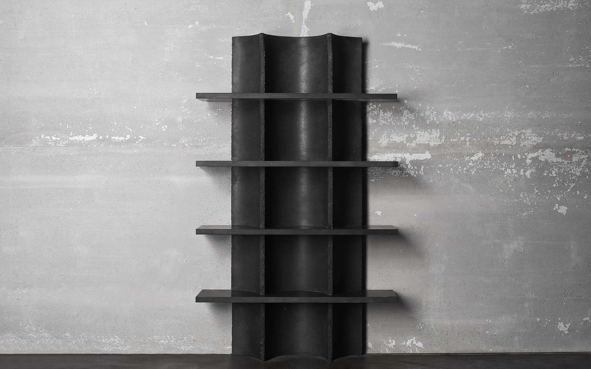 Bufalini black marble bookcase with sculpted fluted column designed by Paolo Ulian