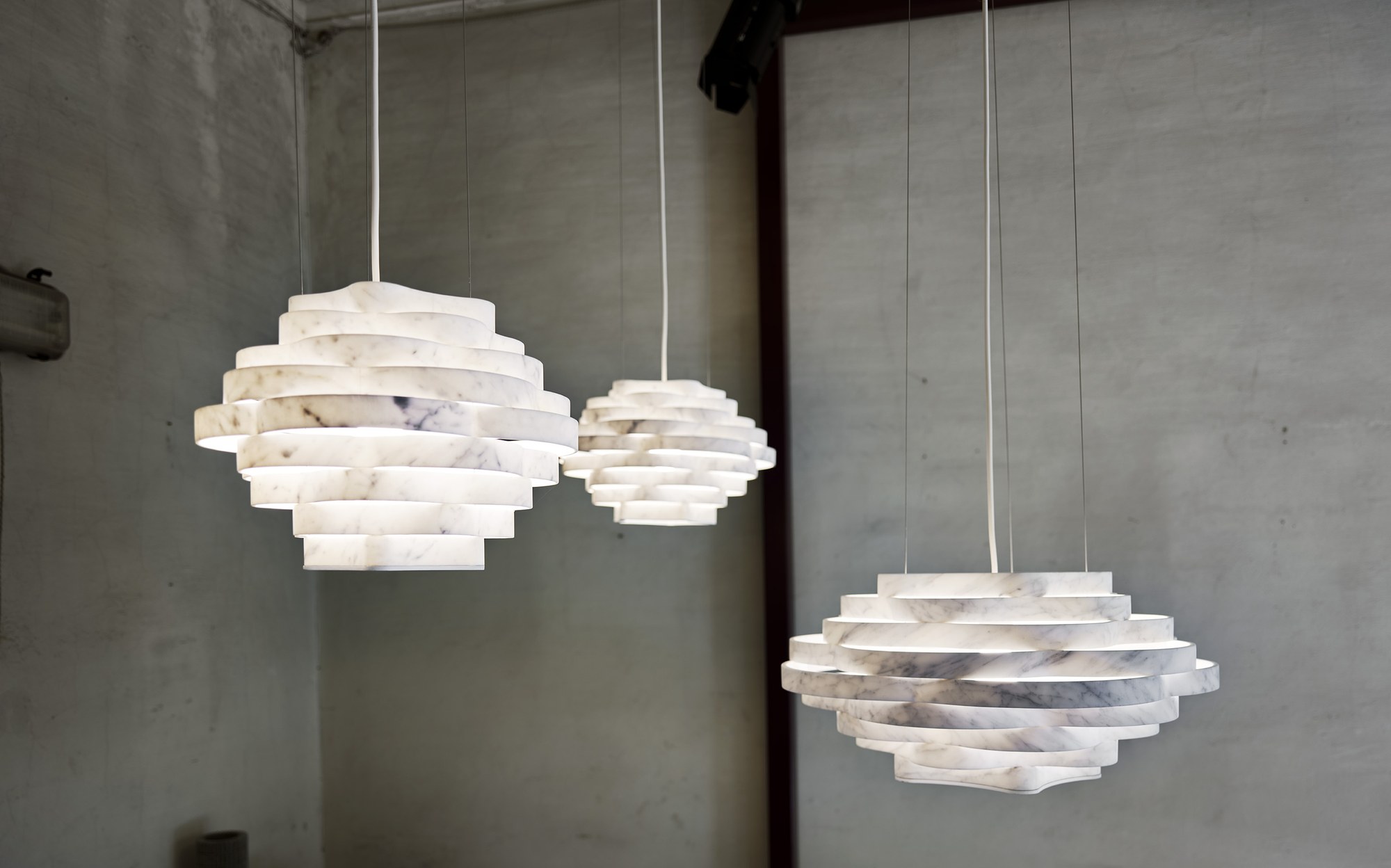 Bufalini sliced white marble pendant lamps designed by Paolo Ulian
