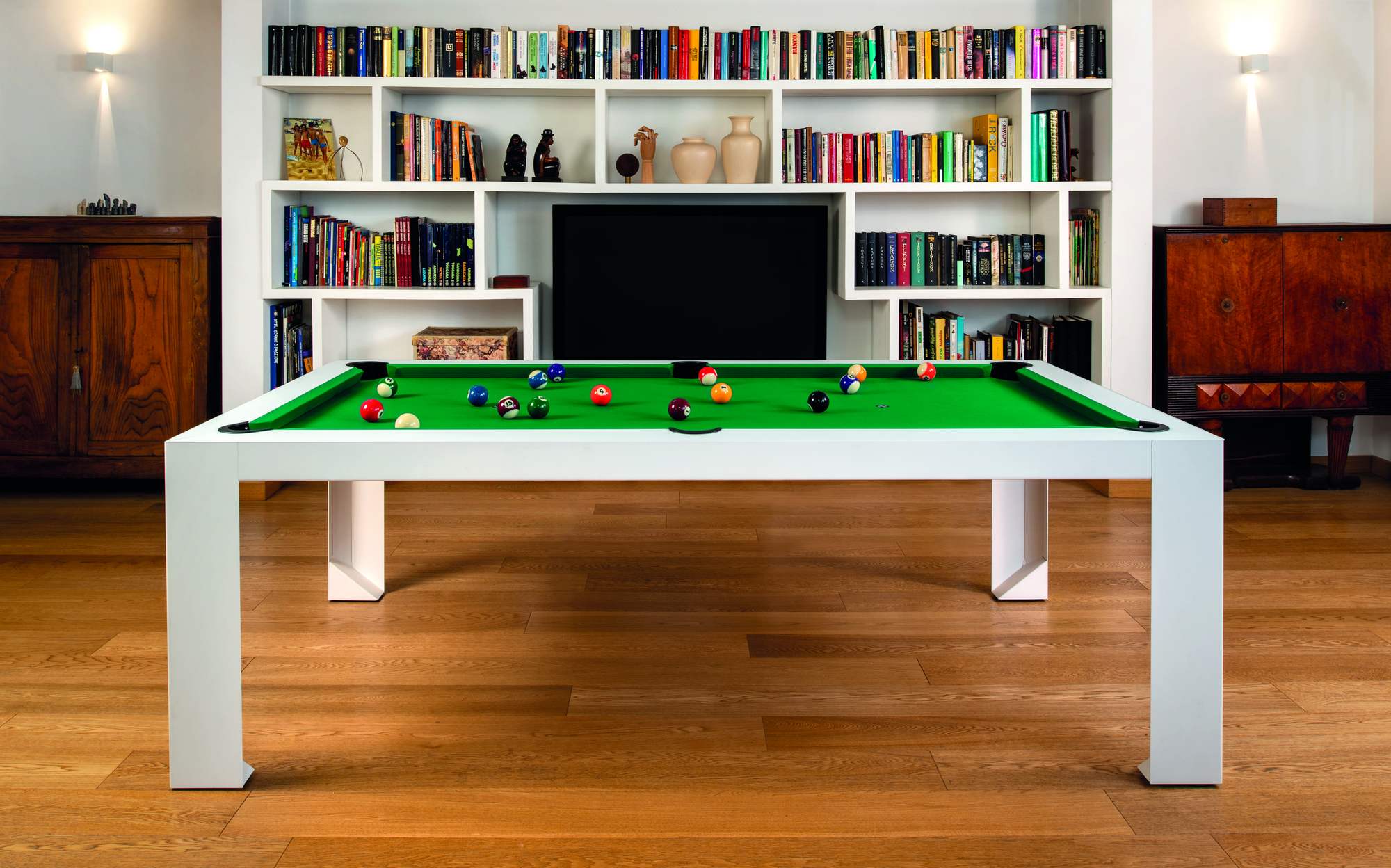 FAS Pendezza Cubista 7 ft designer pool table in a luxury living room with bookcase