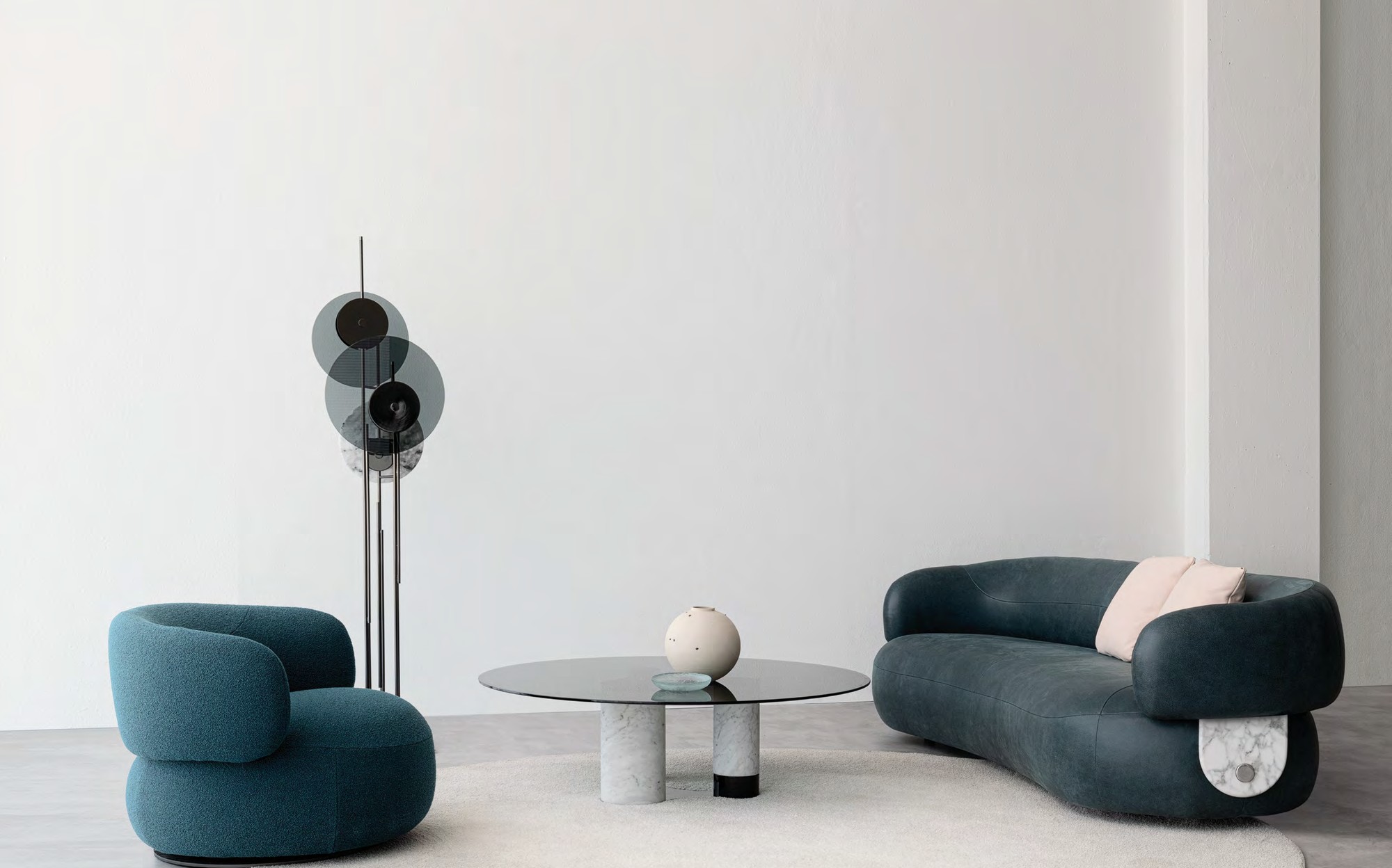 Lenzi Home Collection 2024 blue boucle sofa and armchair with glass coffee table Lenzi Home Collection 2024 blue boucle sofa and armchair with glass coffee table – Italian luxury furniture