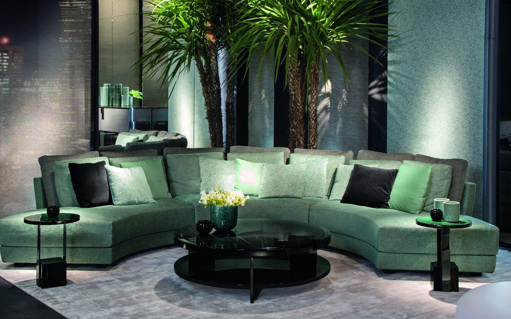 Malerba Black and More New in Town living room with curved sofa and round coffee table Malerba Black and More New in Town living room with curved sofa and round coffee table – contemporary Italian luxury furniture