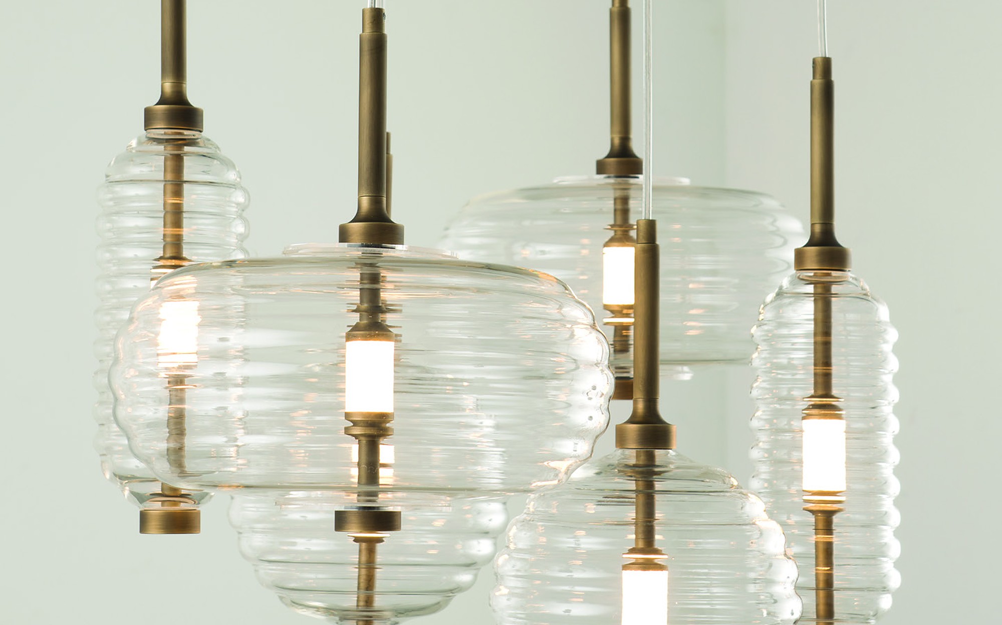 Patrizia Garganti Trinity ribbed glass pendants with bronze details Patrizia Garganti Trinity ribbed glass pendants with bronze details – Italian luxury decorative lighting