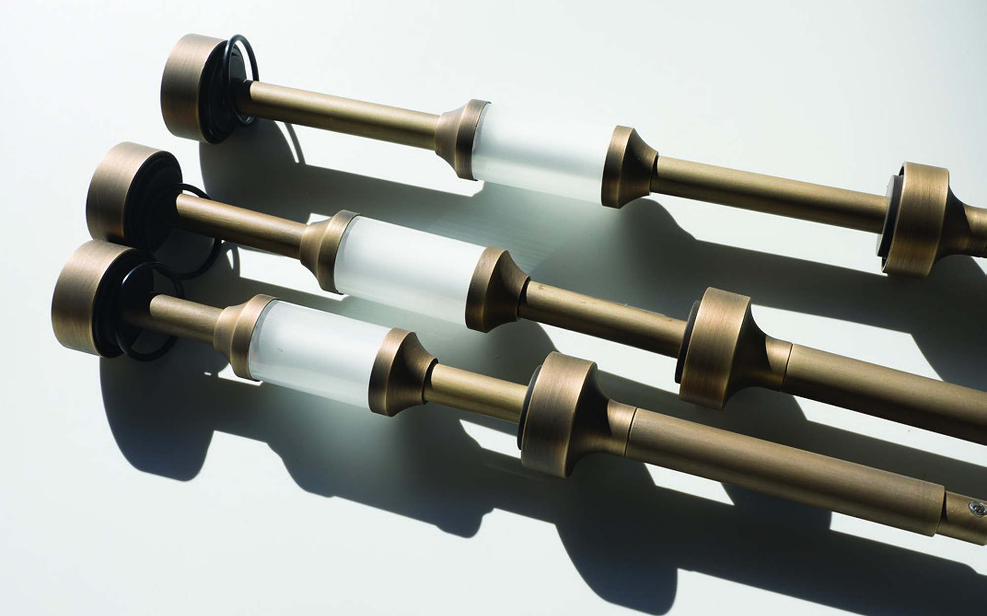 Patrizia Garganti Trinity bronze-finish metal stems Patrizia Garganti Trinity bronze-finish metal stems – Italian luxury decorative lighting