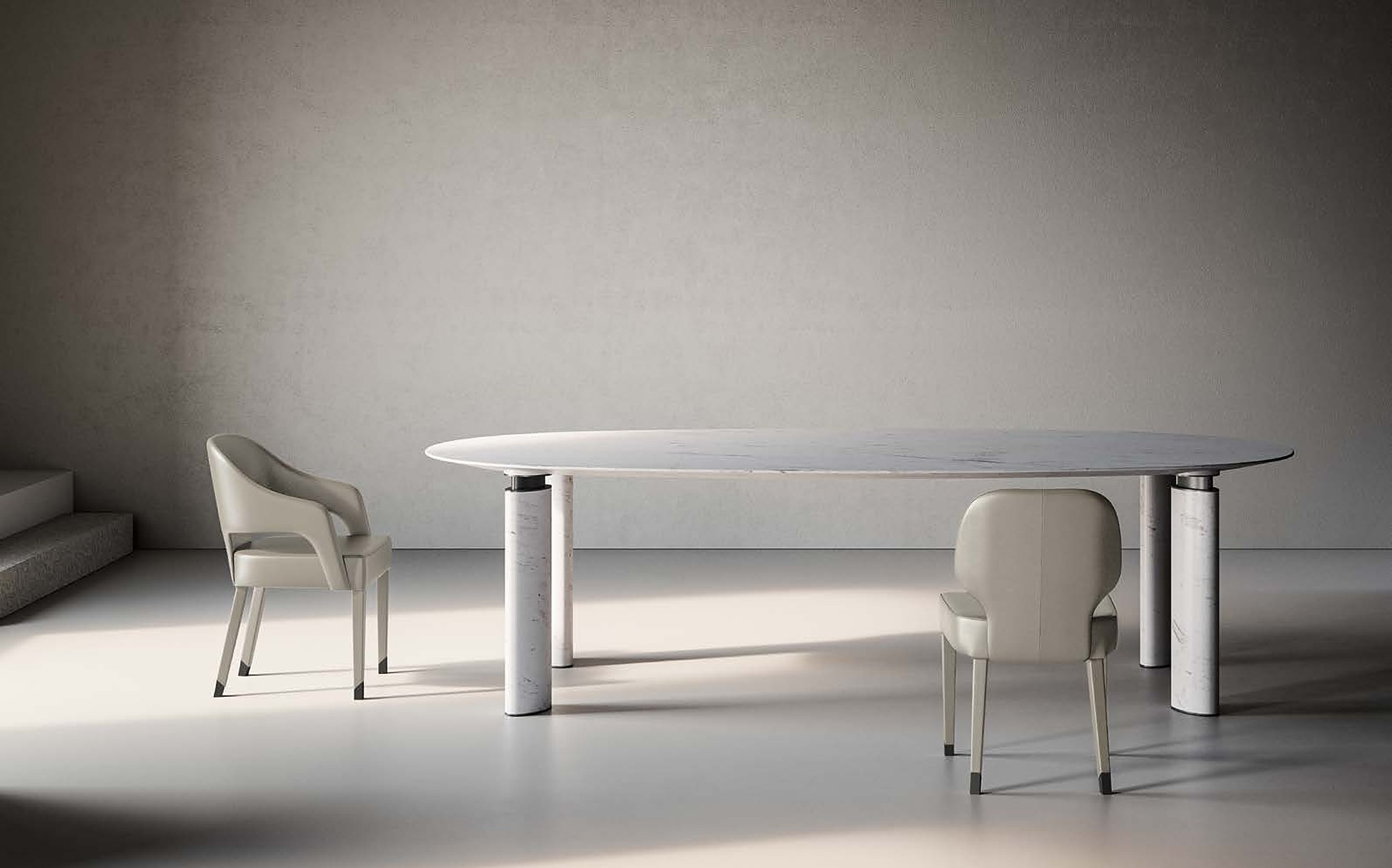 Profilo9 Collection 2026 oval marble dining table with armchairs Profilo9 Collection 2026 oval marble dining table with armchairs – Italian luxury furniture in marble and metal