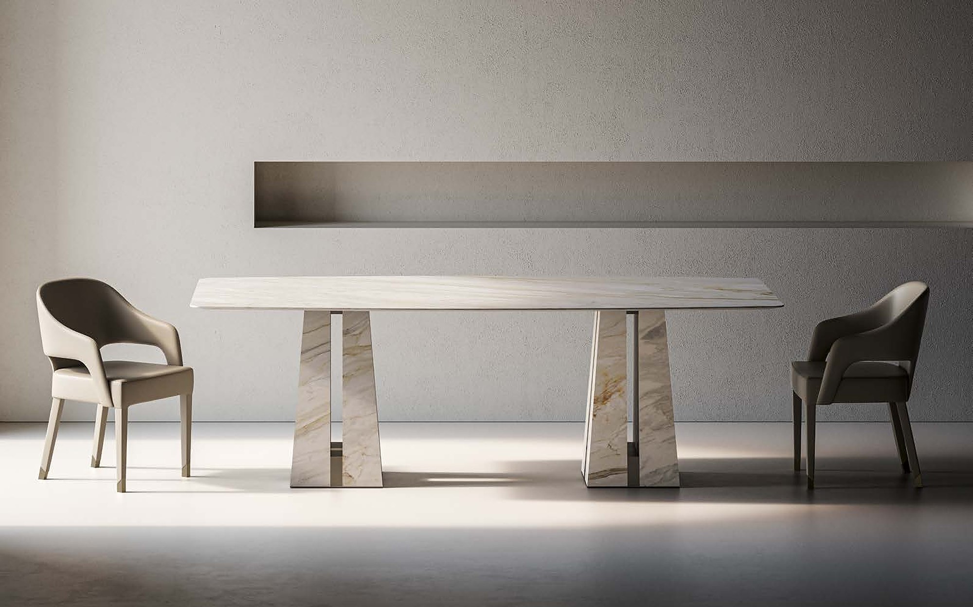 Profilo9 Collection 2026 marble dining table with sculptural legs and armchairs Profilo9 Collection 2026 marble dining table with sculptural legs and armchairs – Italian luxury furniture in marble and metal