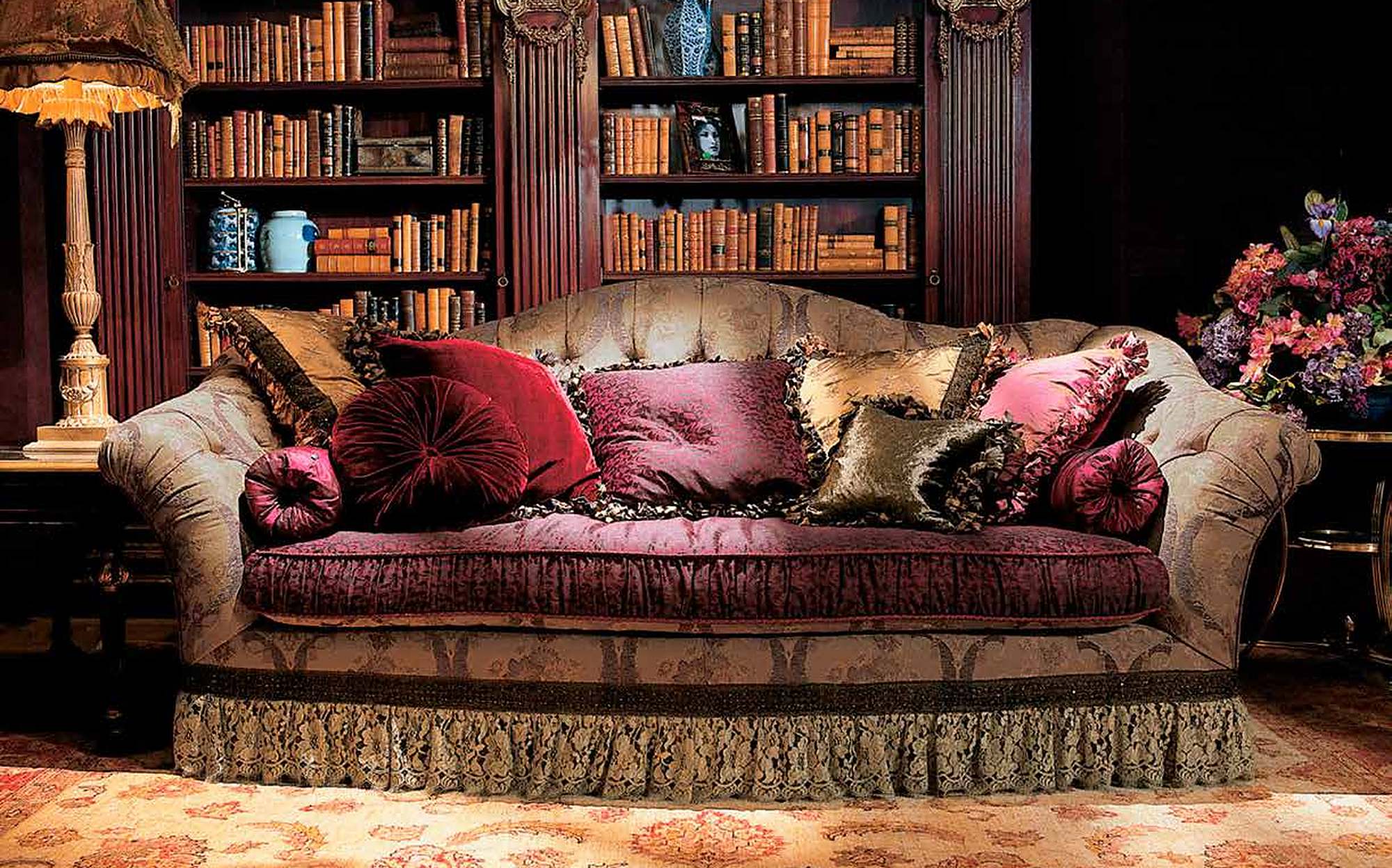 Provasi Heritage sofa with fringes and silk cushions in library Provasi Heritage sofa with fringes and silk cushions in library – classic Italian luxury furniture