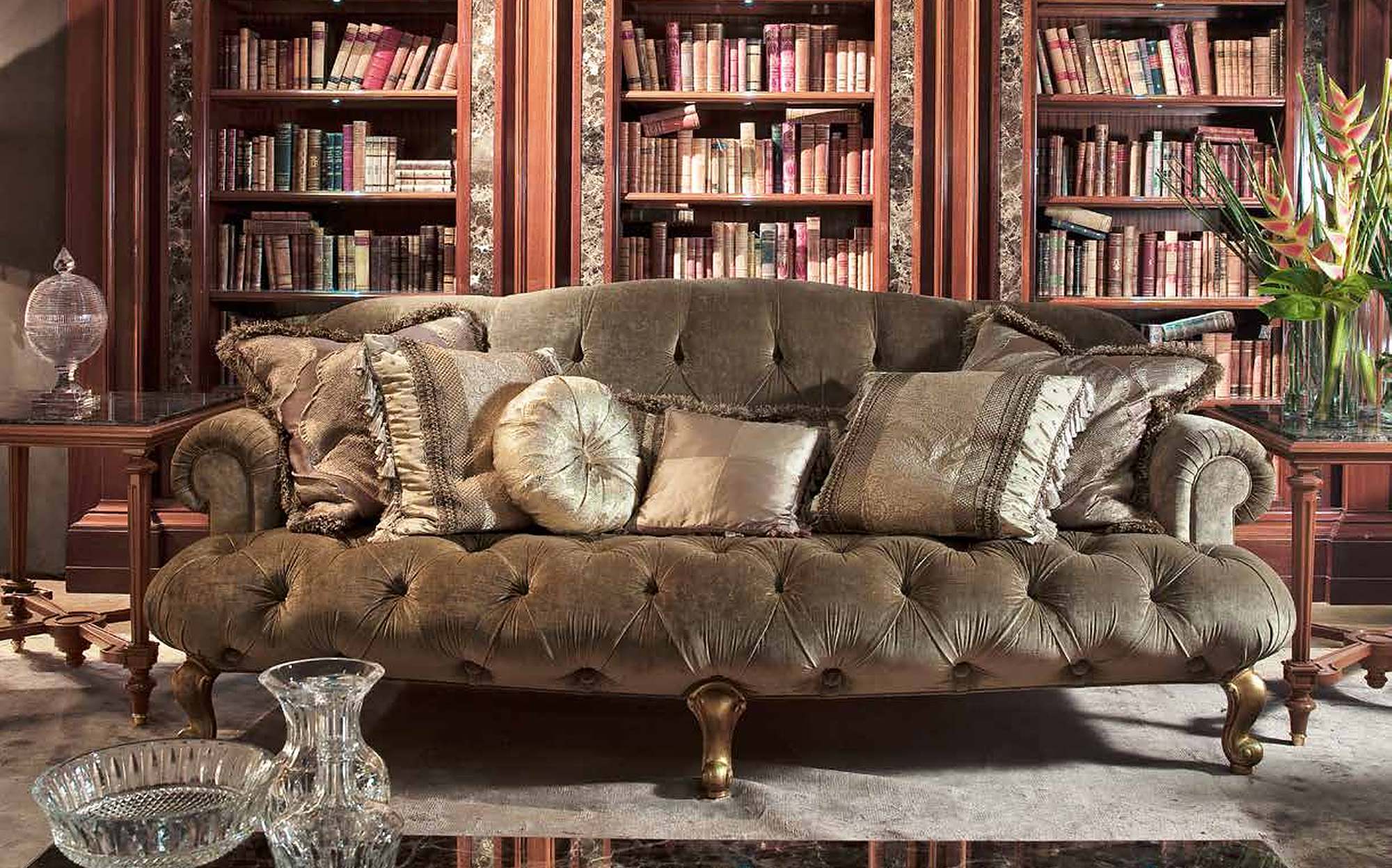 Provasi Heritage capitonné sofa with carved legs in library Provasi Heritage capitonné sofa with carved legs in library – classic Italian luxury furniture