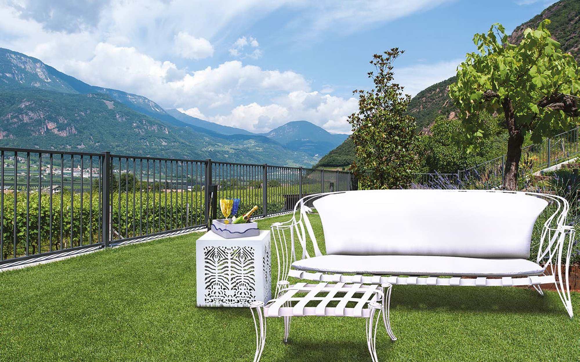 Sergio Villa Opus Garden white sofa and coffee table on terrace with mountain view Sergio Villa Opus Garden white sofa and coffee table on terrace with mountain view – Italian luxury outdoor furniture