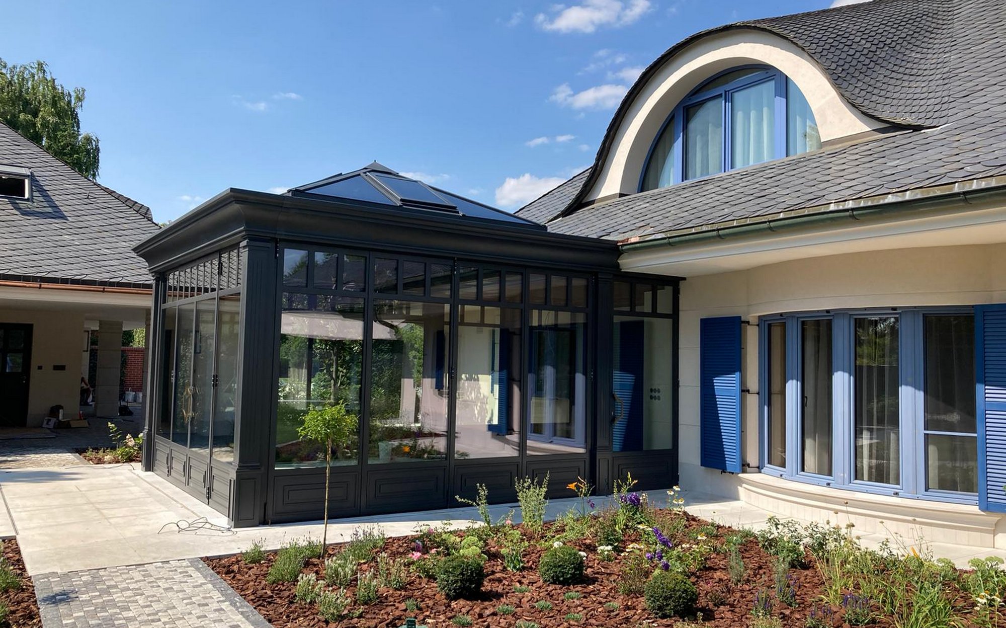 Orangerie Bratislava glass pavilion hospitality project by DFN with iron and glass structure | 101domus