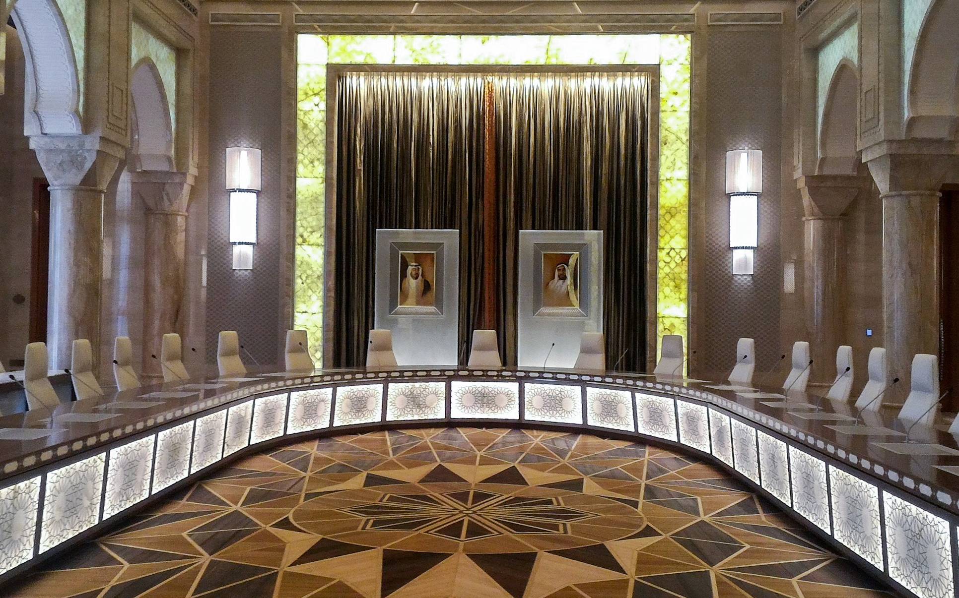 Council hall with curved backlit table and marquetry floor, Presidential Palace Abu Dhabi by Francesco Molon | 101domus