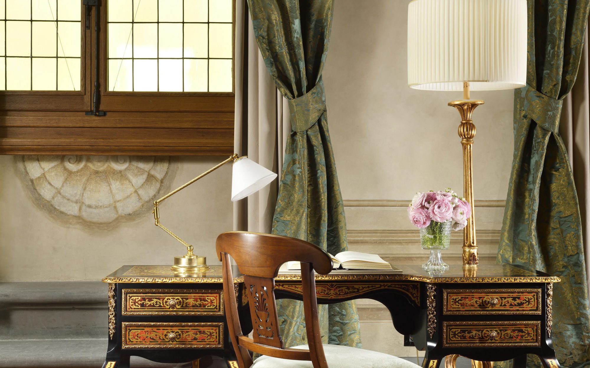 Inlaid writing desk and chair beside silk curtains, Palazzo Portinari Salviati suite Florence | 101domus