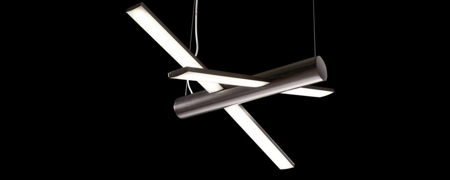 Aggiolight artisans assembling custom lighting elements by hand